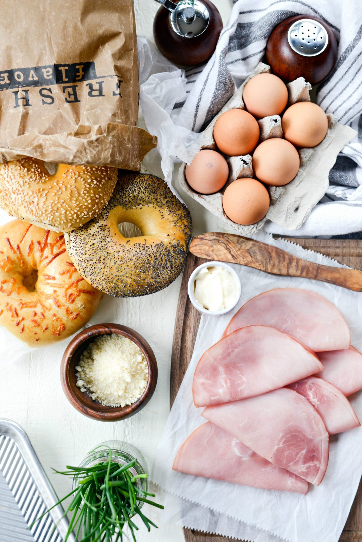 http://www.simplyscratch.com/wp-content/uploads/2019/05/Baked-Egg-in-a-Hole-Bagels-l-SimplyScratch.com-bagels-eggs-ham-sheetpan-mothersday-breakfast-easy-recipe-1-1200x1798.jpg