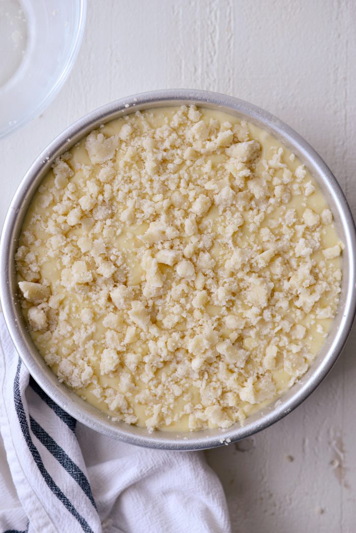 upside down cake sprinkled with crumb topping.