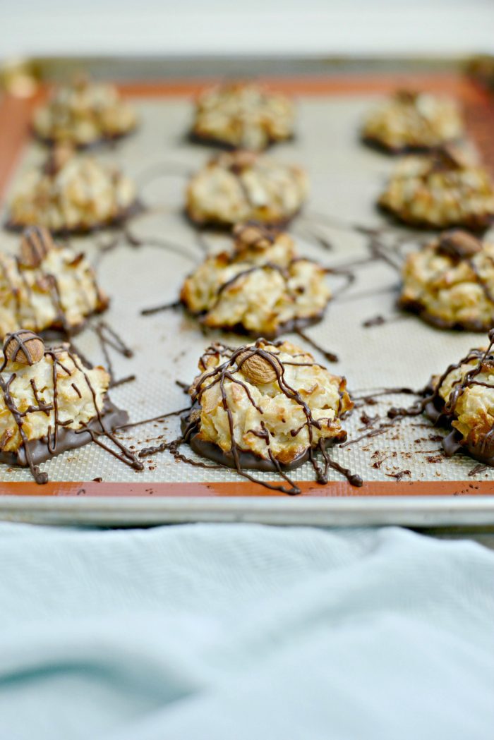 top with an almond and drizzle with melted chocolate