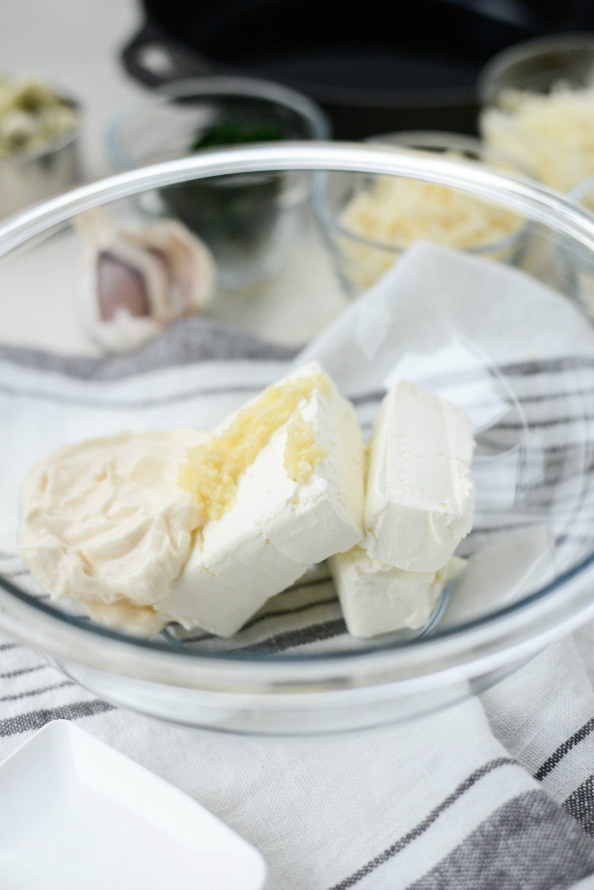 cream cheese, mayo and garlic in a bowl.