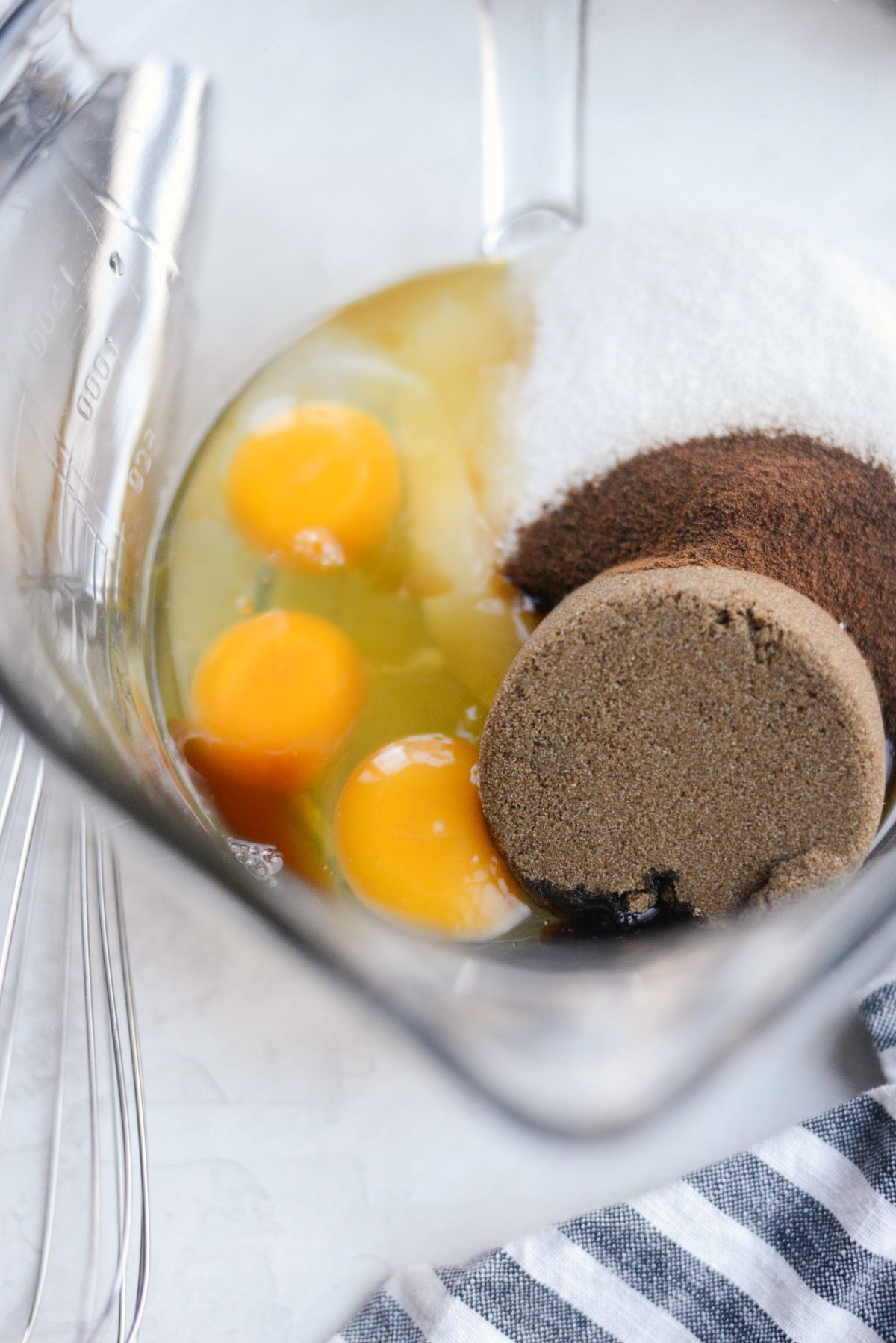 Add eggs, vanilla, sugars and espresso powder to a mixing bowl
