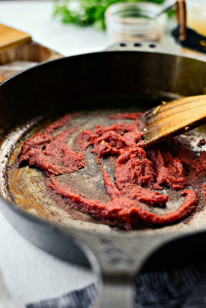 stir and cook tomato paste.