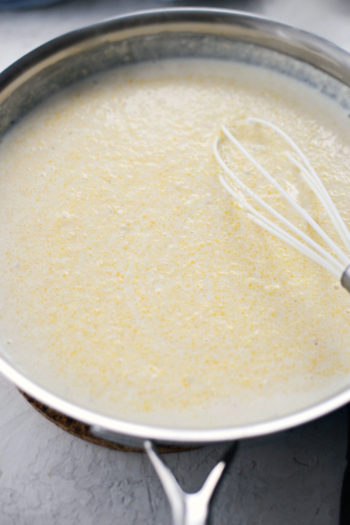 whisk in polenta and salt.