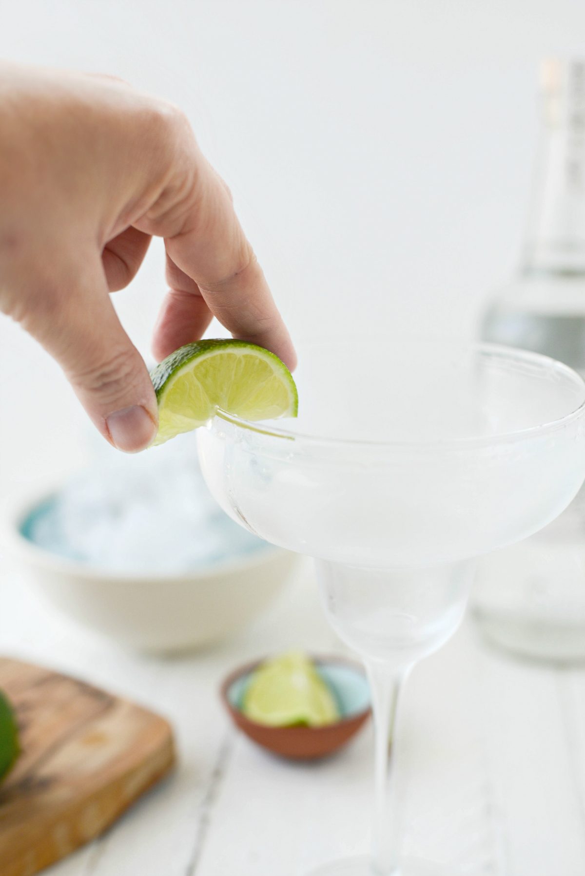 wet rim of glass with wedge of lime.