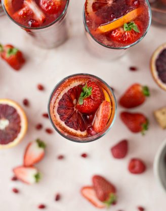 Champagne Sangria l SimplyScratch.com #champagne #sangria #valentinesday #adultbeverage #drink #alcholic #strawberry #pomegranate #raspberry