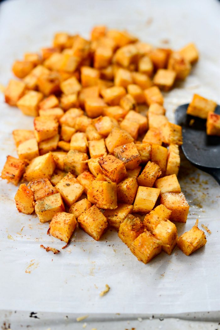 diced pumpkin tossed with dried sage and paprika.