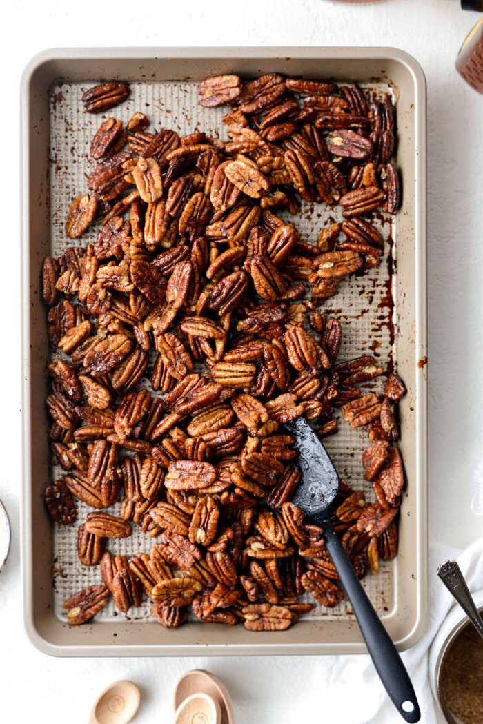 sticky honey vanilla bourbon pecans on sheet pan.