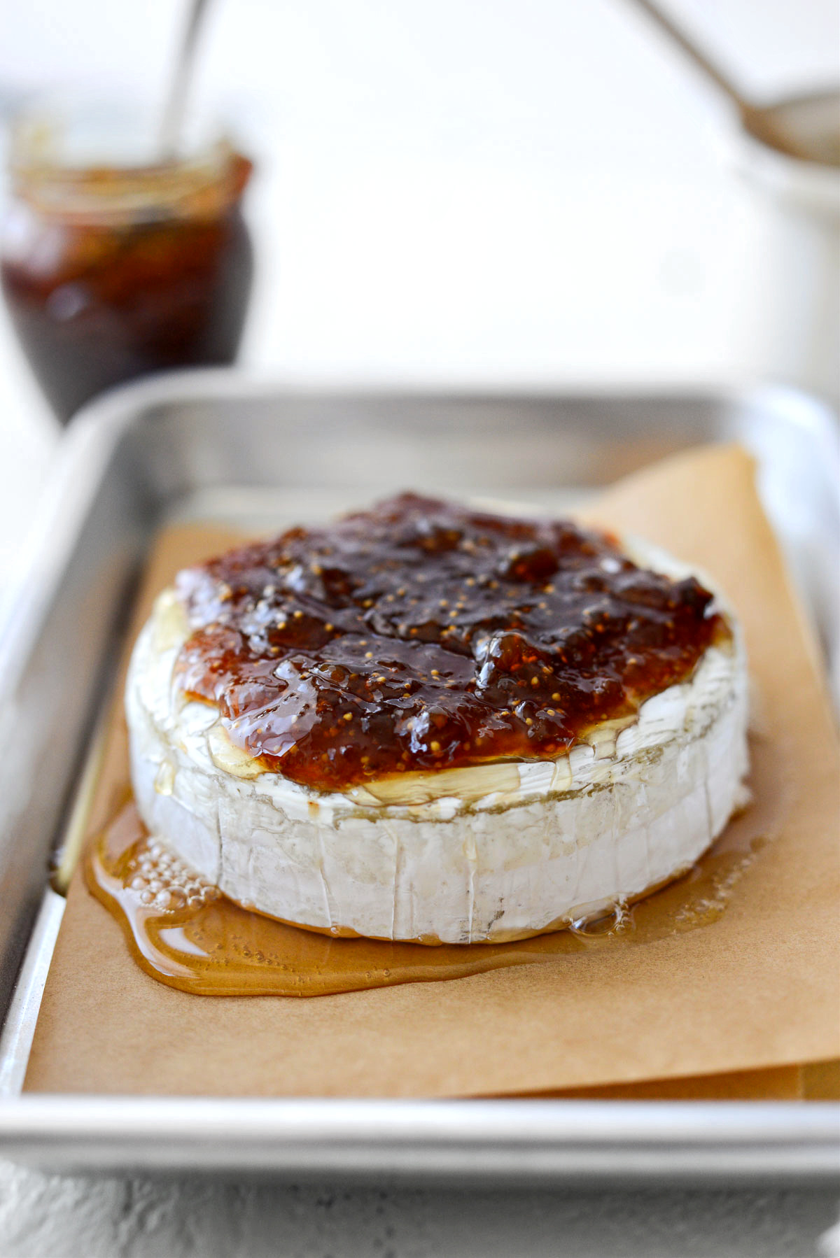 Honey Baked Brie with Fig Jam and Walnuts - Simply Scratch