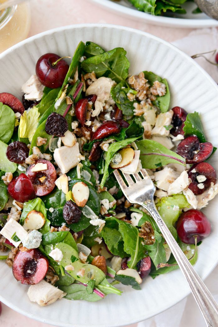 cream bowl with forkful of Cherry Winter Wheat Berry Salad