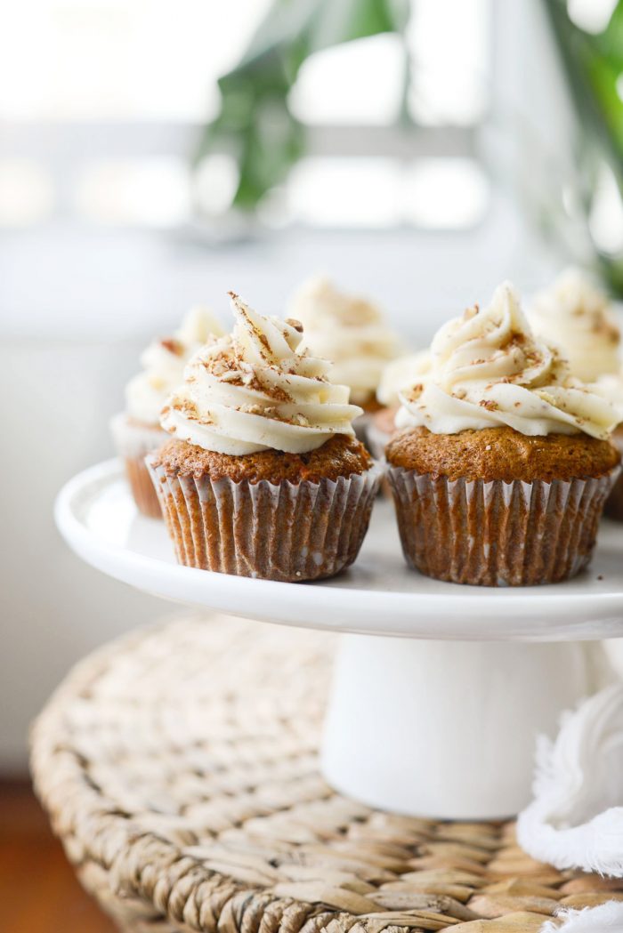 Carrot Cake Cupcakes on a white cake stand
