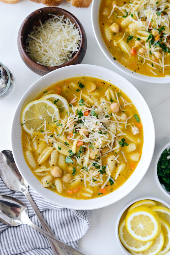 Lemon Chickpea Soup topped with parmesan and parsley.