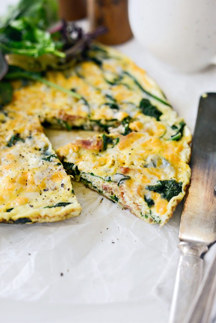 https://www.simplyscratch.com/wp-content/uploads/2023/04/Cheesy-Spinach-Bacon-Frittata-l-SimplyScratch-18-700x1049.jpg