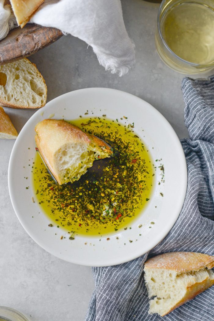 https://www.simplyscratch.com/wp-content/uploads/2023/04/Garlic-Herb-Olive-Oil-Bread-Dip-l-SimplyScratch-15-700x1049.jpg