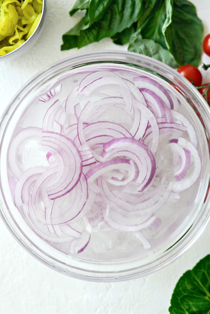 soaking sliced red onions