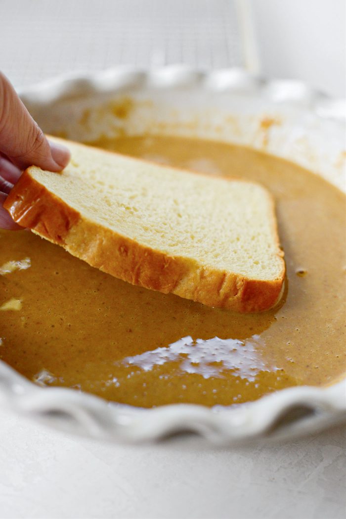 dip bread into pumpkin custard