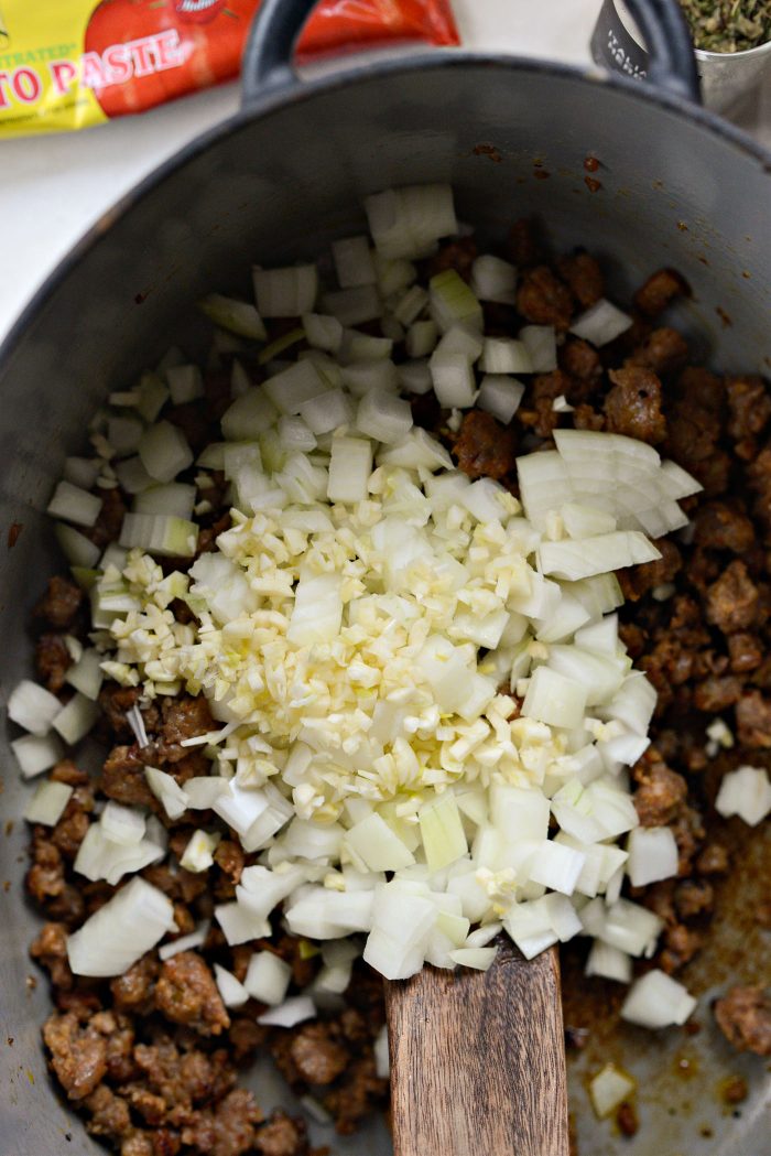 add onions and garlic to browned sausage