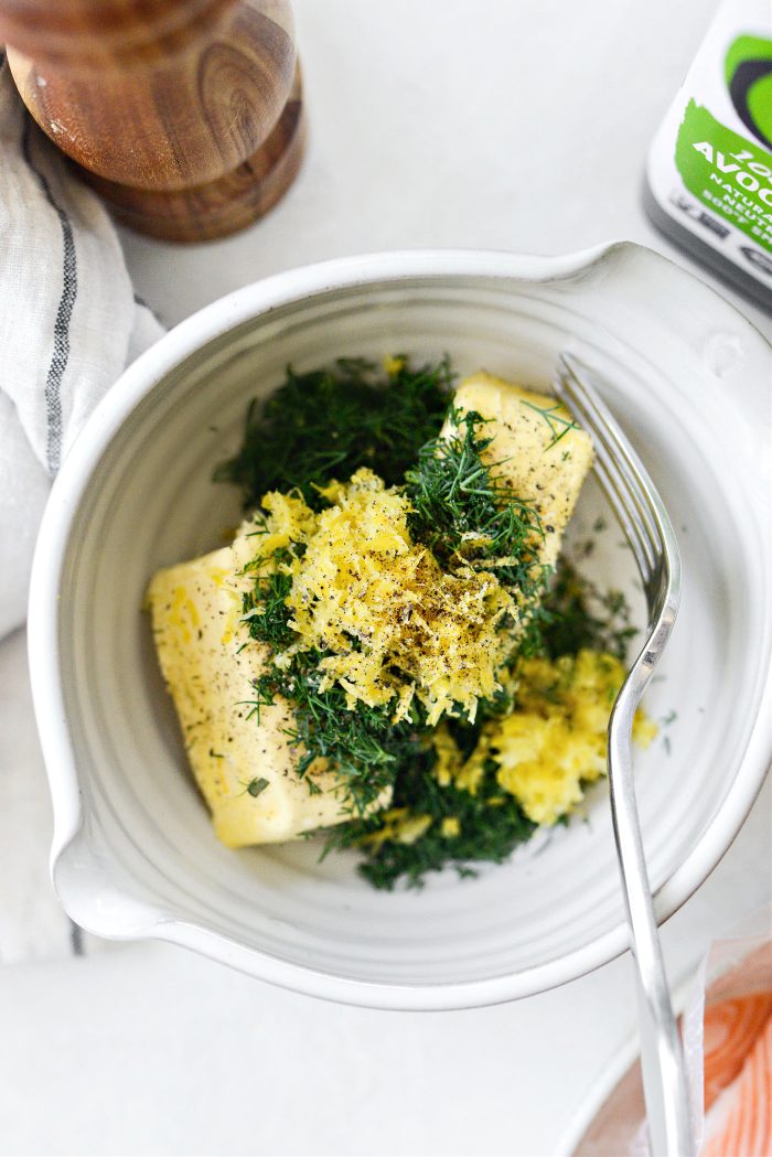 add butter, dill, lemon zest and black pepper to a bowl