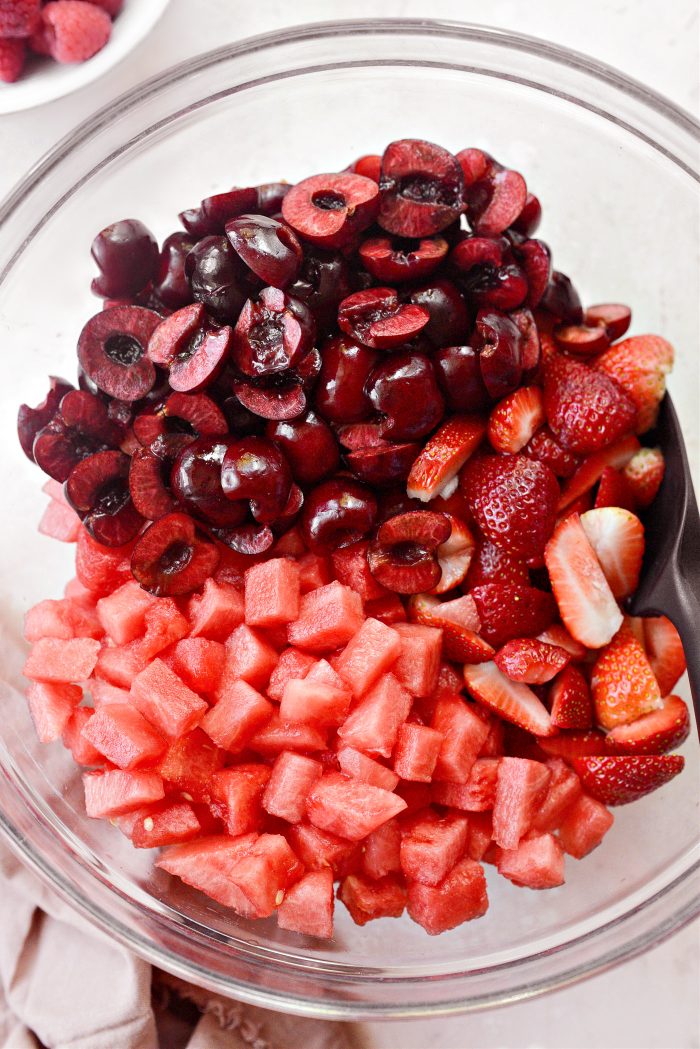 cherries, watermelon and strawberries in bowl