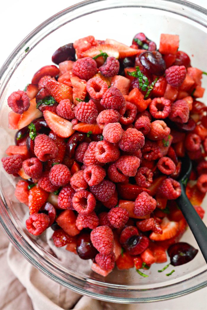 add raspberries and gently toss to combine