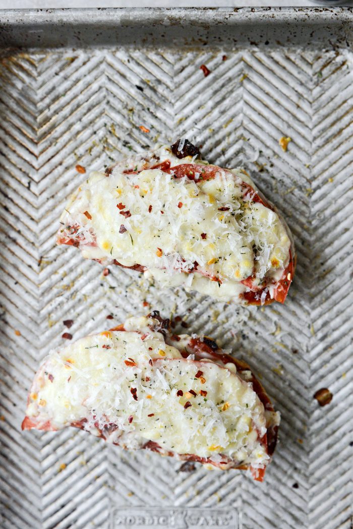 once broiled, top with extra parmesan, Italian seasoning and red pepper flakes