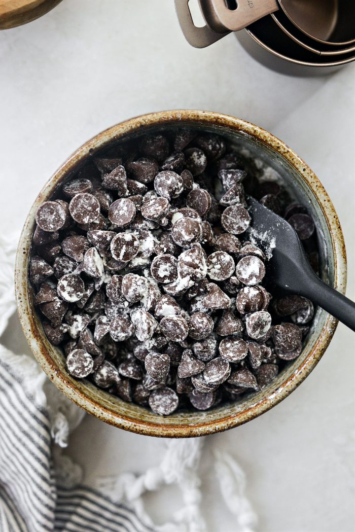 toss chocolate chips in a little flour