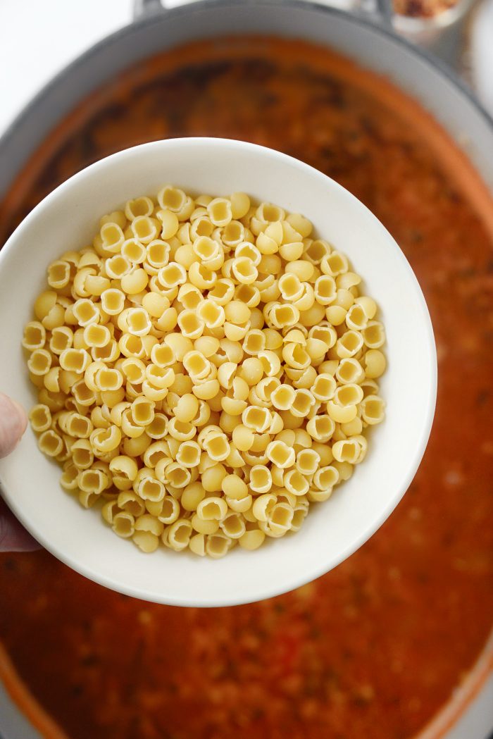 uncover and add in tiny pasta shells