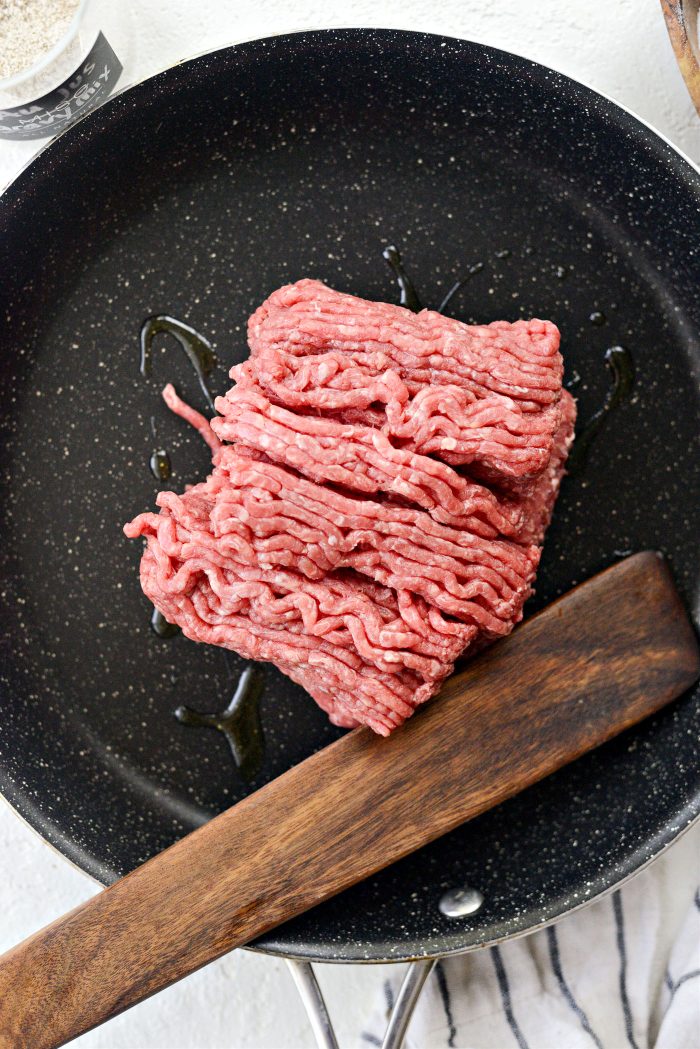 lean ground beef and oil in pan