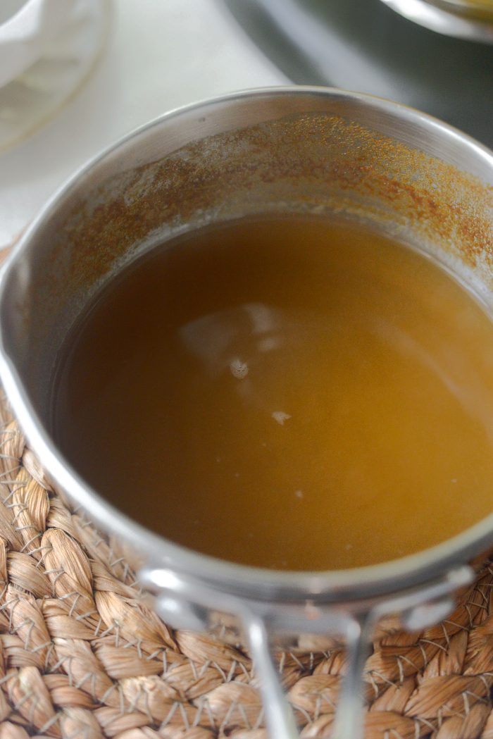 simmer apple cider until reduced