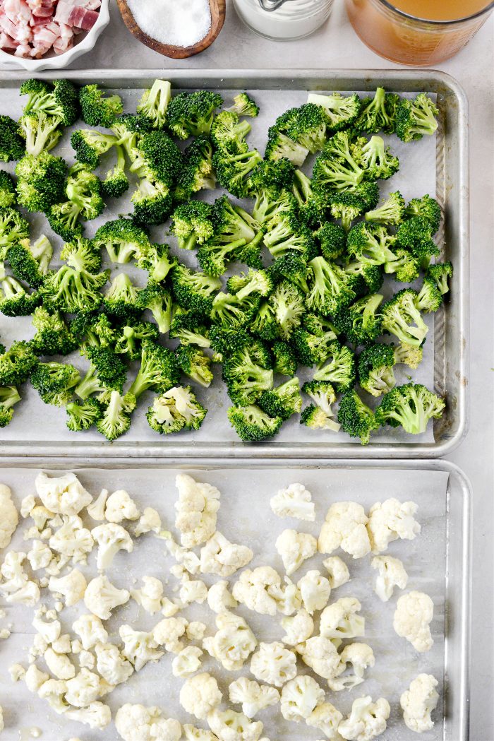 broccoli and cauliflower on lined pans