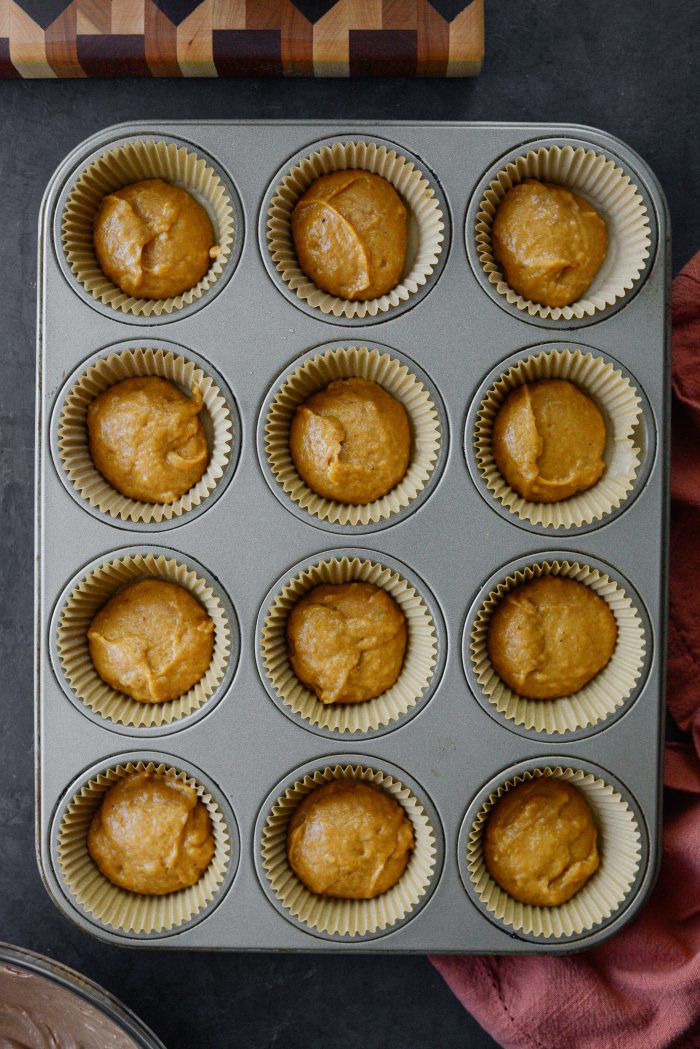 add 2T batter to lined muffin pan