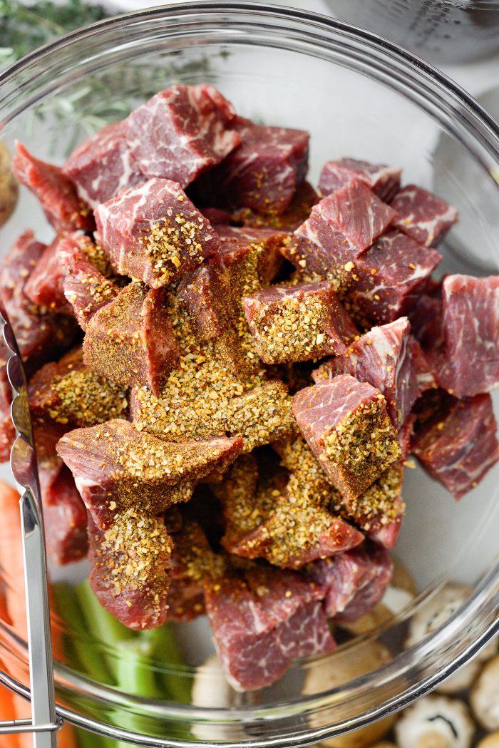 add steak seasoning to cubed beef