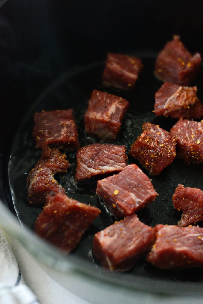 work in batches searing beef on all sides