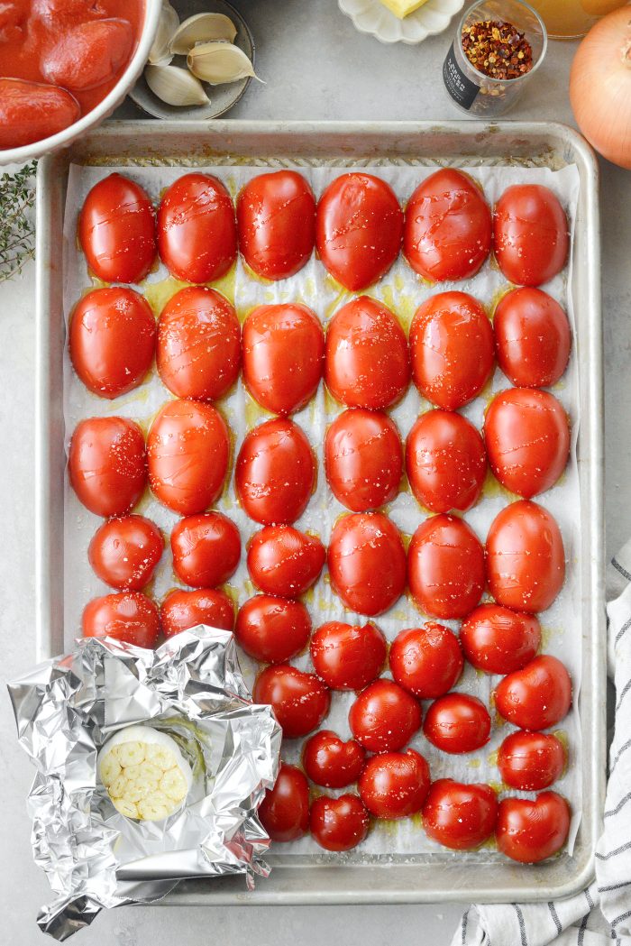 add tomatoes to pan with garlic in foil