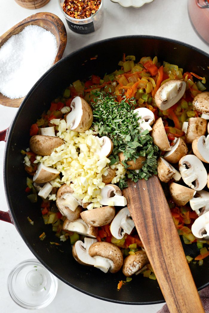 add in mushrooms, garlic, rosemary and sage