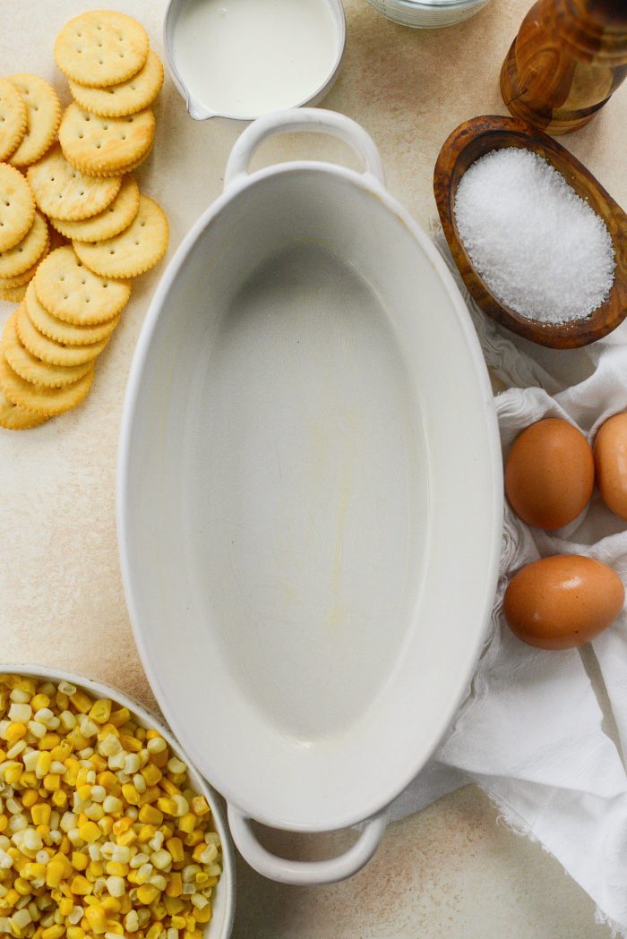 grease dish and preheat oven