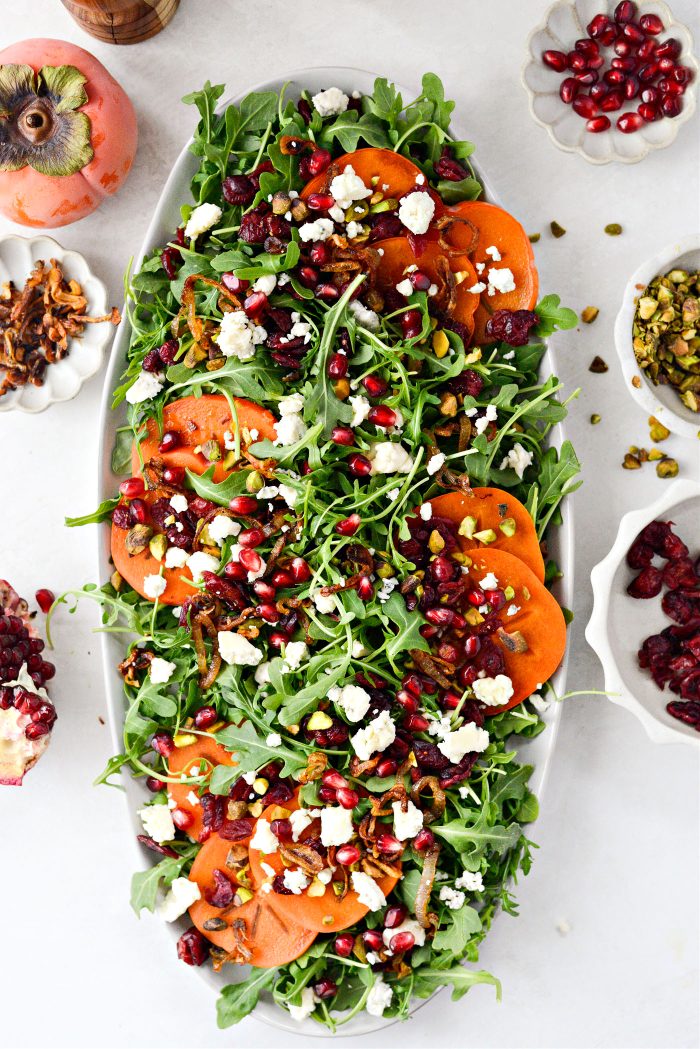 top with pomegranates and blue cheese