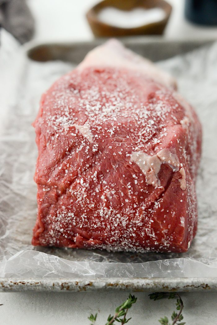 season chuck roast with kosher salt.