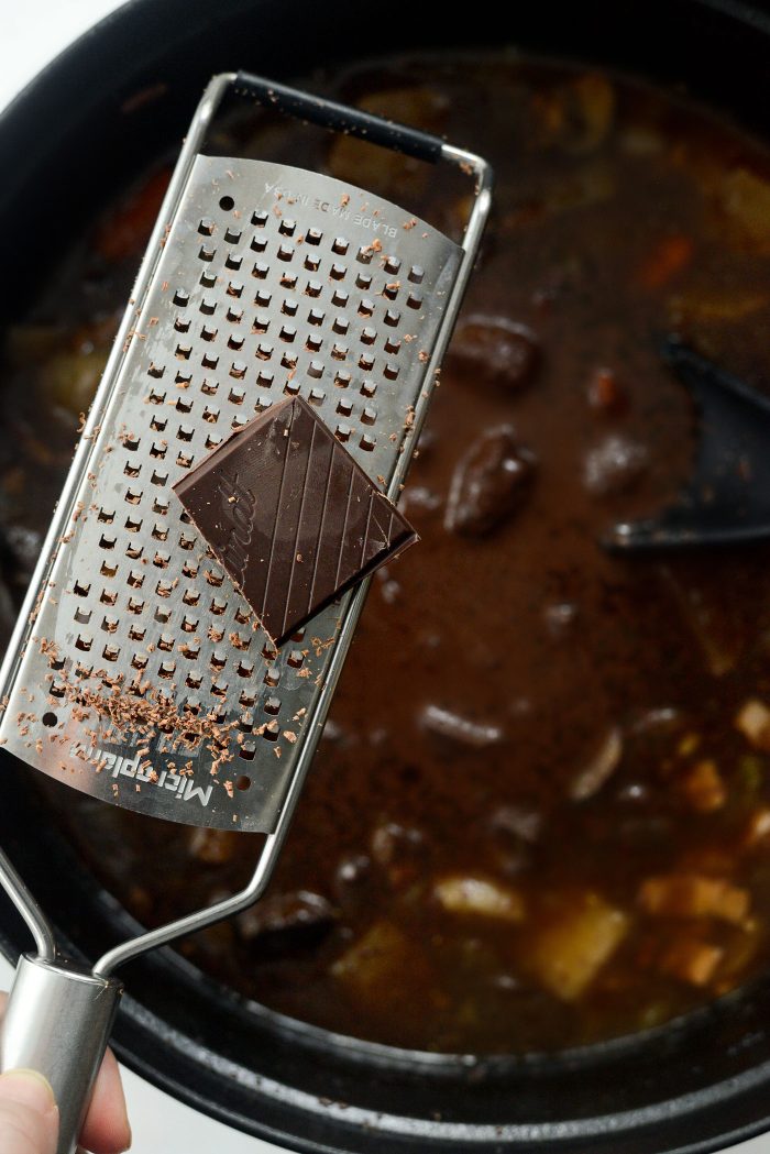 after bubbling subsides, grate in dark chocolate 