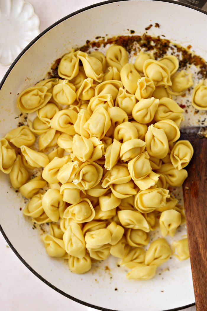 add uncooked tortellini