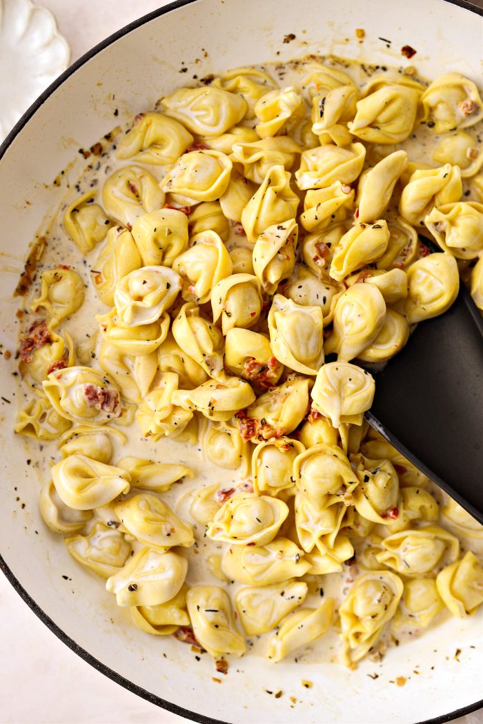 stir and simmer until pasta is cooked and sauce has thickened a bit