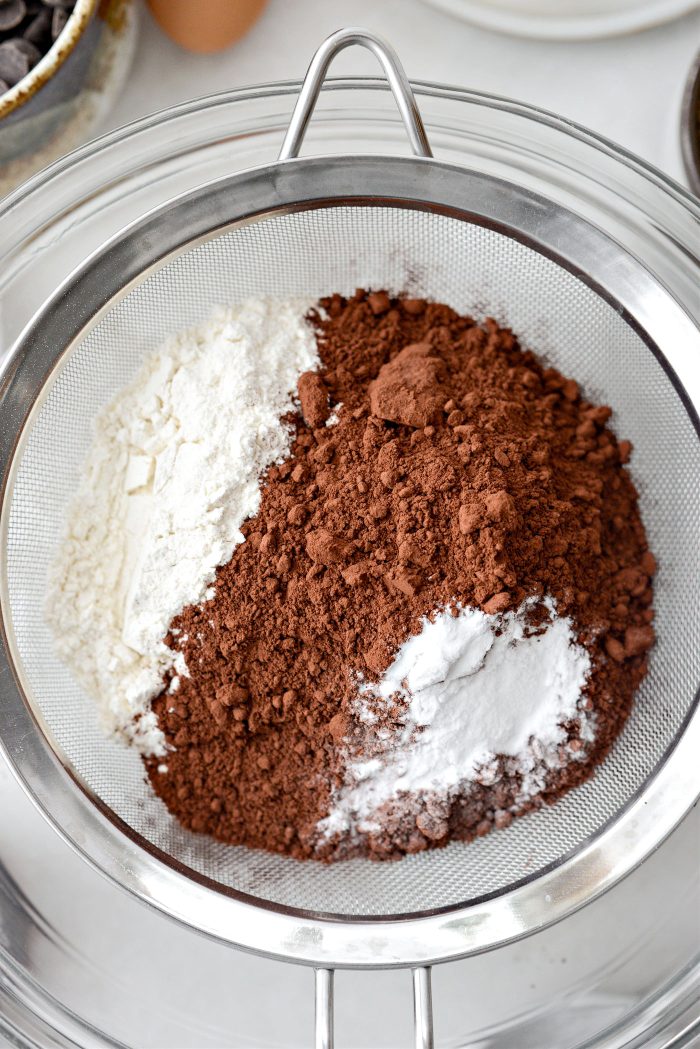 sift flour, dark cocoa powder, baking soda and salt