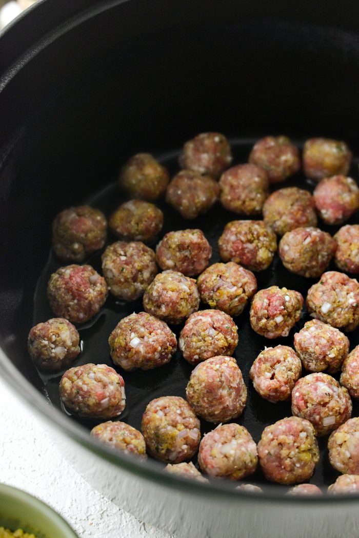 heat oil in large dutch oven and brown meatballs