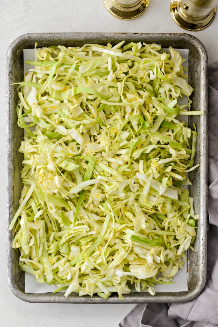 add cabbage to smaller pan