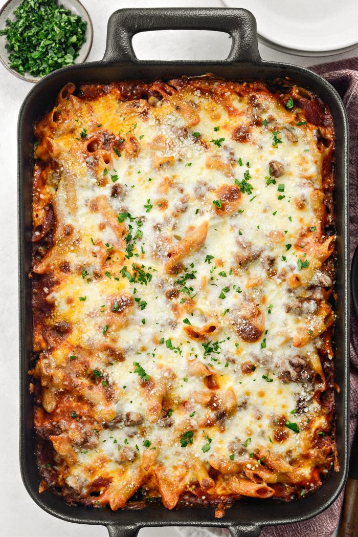 sprinkle baked Mostaccioli with parmesan cheese and parsley